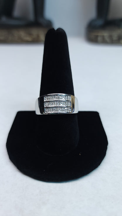 This triple row of 0.20 ctw all Natural Diamonds on a 10k white gold (WG) band is sized for a 10.5 ring finger. This bulky piece is professional and bold at the same time and perfect for daily wear or special nights out.